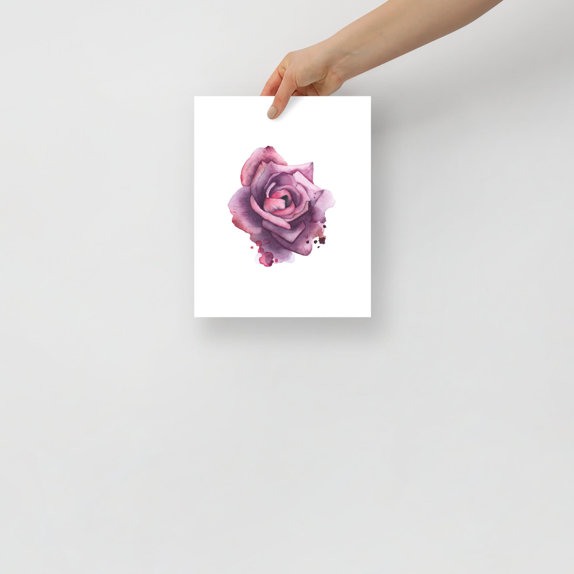 8x10 hand holding a floral wall art print of a sensual watercolor rose from the Playful Awakening collection by Paula Di Marco