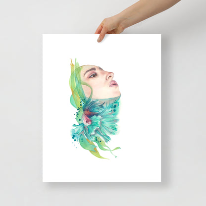 Hand holding a large giclée print of A Breath of Air by Paula Di Marco – ethereal portrait featuring an upward-gazing woman, teal betta fish, and flowing aquatic forms. Printed on archival matte paper, part of the Divine Feminine series.